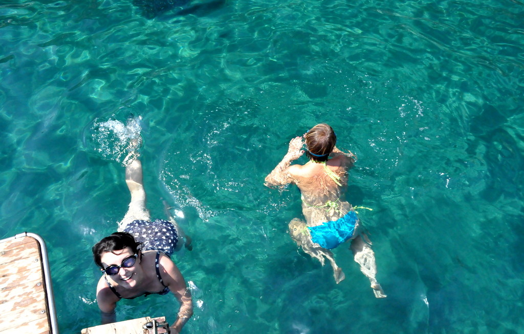 Swimming in the crystal clear waters of the Aegean sea
