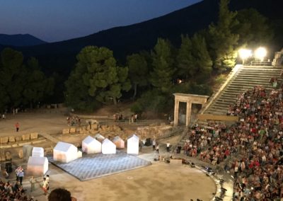 Watching a theatre play at the Ancient Epidaurus Theatre